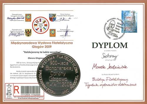 Dyplom i medal Międzynarodowej Wystawy Filatelistycznej Głogów 2009 dla Marka Jedziniaka za Biuletyn Filatelistyczny